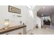 Light and airy entryway with a view of the staircase and a glimpse into the cozy living area at 4507 Monado Dr, Kissimmee, FL 34746