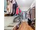 Spacious walk-in closet with plenty of hanging and storage space at 4952 Matteo Trl, Orlando, FL 32839