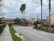 Gated community entrance with well-maintained landscaping and secure access for residents at 4952 Matteo Trl, Orlando, FL 32839