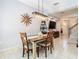 Open dining area connects seamlessly to the living room and staircase at 4952 Matteo Trl, Orlando, FL 32839