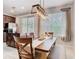 Comfortable dining area with natural light and kitchen access at 4952 Matteo Trl, Orlando, FL 32839