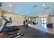 Gym featuring various exercise machines, rubber floor, and ample room at 4952 Matteo Trl, Orlando, FL 32839