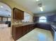Community kitchen with ample storage, counterspace, and an open layout at 4952 Matteo Trl, Orlando, FL 32839
