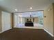 Lounge area with ceiling fans, tile floors, and access to community amenities at 4952 Matteo Trl, Orlando, FL 32839