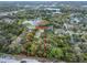 Aerial view of property showcasing lot and surrounding lush greenery at 500 Forest Lake Dr, Altamonte Springs, FL 32714