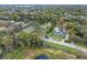 Wide aerial shot showcasing the neighborhood and nearby lake at 500 Forest Lake Dr, Altamonte Springs, FL 32714