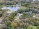 Expansive aerial view of the home and the lush greenery surrounding the area at 500 Forest Lake Dr, Altamonte Springs, FL 32714