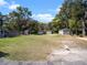 Expansive backyard featuring various outbuildings, offering plenty of space for recreation at 500 Forest Lake Dr, Altamonte Springs, FL 32714