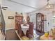 Formal dining room with a large dining table, decorative china cabinet, and elegant decor at 500 Forest Lake Dr, Altamonte Springs, FL 32714