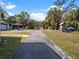 Long driveway and multiple outbuildings offer plenty of space for work and play at 500 Forest Lake Dr, Altamonte Springs, FL 32714