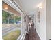 Bright hallway with a large picture window that fills the space with natural light at 500 Forest Lake Dr, Altamonte Springs, FL 32714