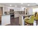 Bright, renovated kitchen featuring granite countertops, ample cabinet space, and stainless steel appliances at 500 Forest Lake Dr, Altamonte Springs, FL 32714