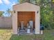 Outdoor shed with water softener and storage unit surrounded by greenery at 500 Forest Lake Dr, Altamonte Springs, FL 32714