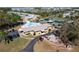Aerial view of community clubhouse, pool, putting green, and tennis courts, offering an active and social lifestyle at 519 Tivoli Park Dr, Davenport, FL 33897