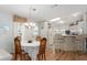 Open floor plan with dining area and kitchen with bar seating at 519 Tivoli Park Dr, Davenport, FL 33897