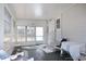 Bright and airy sunroom with large windows and an access door to the backyard at 519 Tivoli Park Dr, Davenport, FL 33897