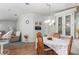 Open floor plan with living room, dining area, and built-in hutch at 519 Tivoli Park Dr, Davenport, FL 33897