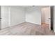 Bedroom featuring neutral carpet and white walls, including doors to the closet and hallway at 5719 Cattle Ranch Dr, St Cloud, FL 34771