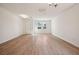Bright and airy living space with hardwood flooring, recessed lighting, and an abundance of natural light at 5719 Cattle Ranch Dr, St Cloud, FL 34771