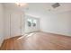 Inviting living area featuring beautiful hardwood floors, a neutral color palette, and a welcoming ambiance at 5719 Cattle Ranch Dr, St Cloud, FL 34771