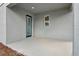 Covered patio with concrete floor and glass door at 5719 Cattle Ranch Dr, St Cloud, FL 34771