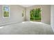 Bright, spacious bedroom with large windows and a sliding door for natural light at 5850 Sheryl Anita St, Oviedo, FL 32765