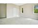 Large bedroom featuring soft carpet, neutral paint and windows with tree views at 5850 Sheryl Anita St, Oviedo, FL 32765