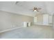 Bedroom featuring a vaulted ceiling, soft carpet and a built-in desk area at 5850 Sheryl Anita St, Oviedo, FL 32765