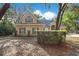 Charming two-story home with a well-maintained lawn and mature trees, providing a serene and inviting atmosphere at 5850 Sheryl Anita St, Oviedo, FL 32765