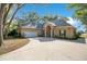Spacious single-Gathering home with a two-car garage and a wide driveway at 5850 Sheryl Anita St, Oviedo, FL 32765