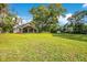 Beautiful home surrounded by a large yard and mature trees at 5850 Sheryl Anita St, Oviedo, FL 32765