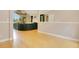 Spacious living room featuring wood floors, high ceilings, and natural light at 5850 Sheryl Anita St, Oviedo, FL 32765