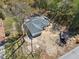Aerial view of the new construction home with partial tree coverage at 6551 Hemlock Rd, Ocala, FL 34472