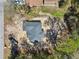 An aerial close-up of the new house, highlighting its roof design and location within the lot at 6551 Hemlock Rd, Ocala, FL 34472