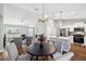 Open floor plan showcasing the living room, dining area, and kitchen, creating a welcoming atmosphere at 6551 Hemlock Rd, Ocala, FL 34472
