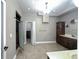 A spacious bathroom featuring a shower, cabinets and a vanity with a sink at 714 Kankakee Ln, Orlando, FL 32807