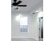 Bright bedroom featuring neutral walls and trim, recessed lighting, and neutral carpeting at 714 Kankakee Ln, Orlando, FL 32807