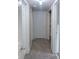 Hallway view with carpeted flooring and closet for storage at 714 Kankakee Ln, Orlando, FL 32807