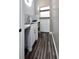 This laundry room features modern cabinets and a white countertop with a stainless steel sink at 714 Kankakee Ln, Orlando, FL 32807