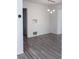 Bright living room featuring wood-look floors and modern lighting at 714 Kankakee Ln, Orlando, FL 32807