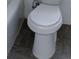 Close up view of a white toilet and tiled walls at 714 Kankakee Ln, Orlando, FL 32807