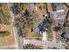 Aerial view of the house showcasing its location and surrounding neighborhood at 75 Chaney Dr, Casselberry, FL 32707