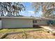 Backyard with a small garden and storage for recreational watercraft at 75 Chaney Dr, Casselberry, FL 32707