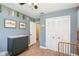 Bright Bedroom featuring a changing table, a closet, and neutral wall colors at 75 Chaney Dr, Casselberry, FL 32707