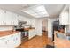 Functional kitchen features white cabinets, stainless steel appliances and an easy access oven for great cooking at 75 Chaney Dr, Casselberry, FL 32707