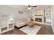 Cozy living room with a traditional fireplace and neutral décor, perfect for relaxation and comfort at 75 Chaney Dr, Casselberry, FL 32707