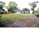 Spacious backyard with mature trees, providing plenty of shade and privacy at 904 Crestwood Ln, Altamonte Springs, FL 32701