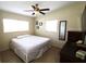 Bedroom featuring ceiling fan and two windows at 904 Crestwood Ln, Altamonte Springs, FL 32701