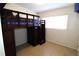 A bedroom featuring wooden bunk beds and ceramic tile flooring at 904 Crestwood Ln, Altamonte Springs, FL 32701