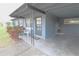 Exterior view of the carport with inviting entryway and cozy seating area at 904 Crestwood Ln, Altamonte Springs, FL 32701